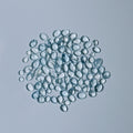 Clear Blue glass beads on a white background
