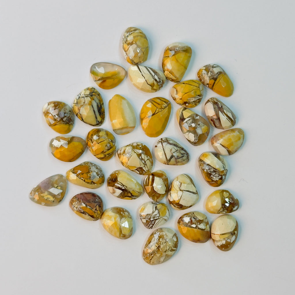 Collection of marbled stones on a light gray background