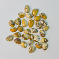 Collection of marbled stones on a light gray background