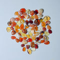 Collection of multicolored gemstones on a White background