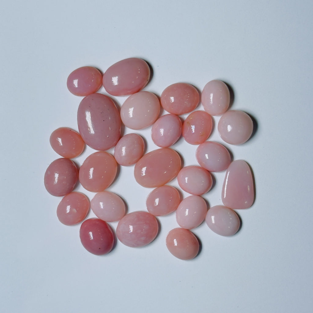 Pink stones on a light gray background