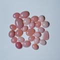 Pink stones on a light gray background