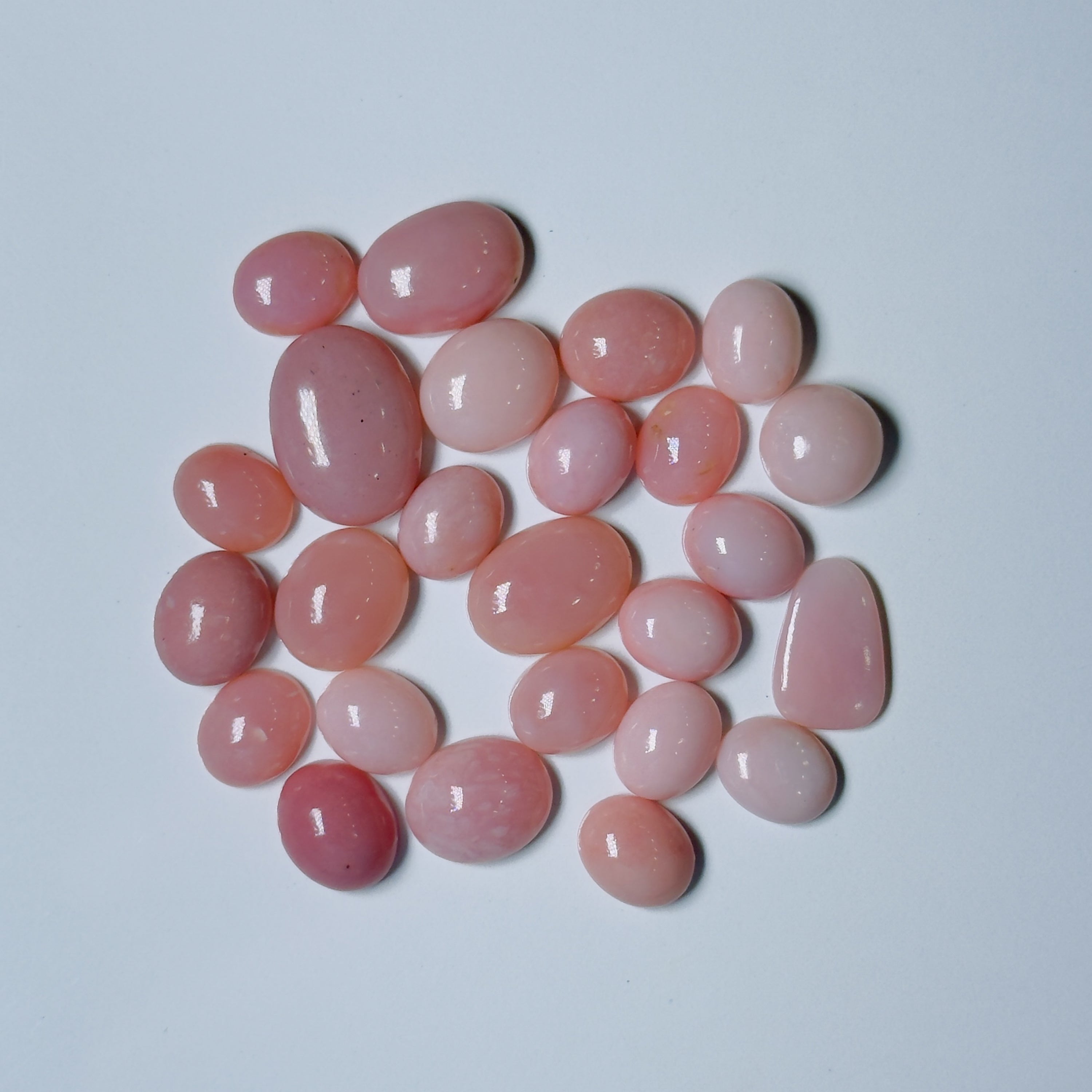 Pink stones on a light gray background